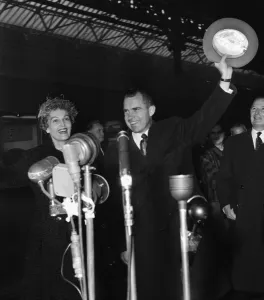 American Vice President Richard Nixon with his wife at Victoria Station in London 1958