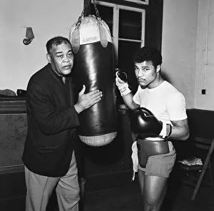 Exercise Prints: American former world heavyweight boxing champion Joe Louis (left