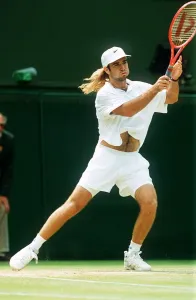 Long Hair Prints: Andre Agassi plays John McEnroe in the Mens Singles Semi-Final Tennis at Wimbledon