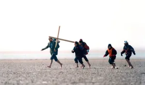 Andrew Campbell, from the Hexham Group, heads across the causeway to Holy Island with a
