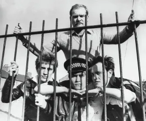 Railings Prints: Angelic Upstarts left to right Derek Wade, Mond Cowie