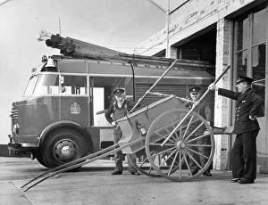 00072 Prints: Anicient and modern fire engines stand side by side at Morpeth Fire Station