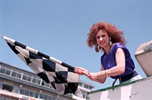Finish Line Prints: ANITA DOBSON WITH THE CHEQUERED FLAG AT THE MOTOR RACING 26 / 05 / 1992