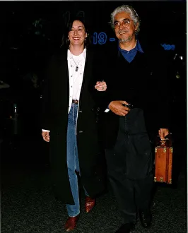 Anjelica Huston actress with her husband Robert Graham leaving Heathrow for Los Angeles