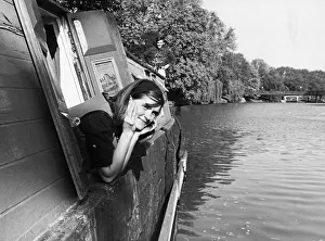 Scenic Prints: Ann Neville enjoying the beauty of the Cambridgeshire countryside as she leans her head