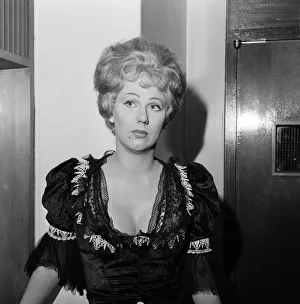 Anna Karen, aged 24, a dancer, last night left her poodle Lucky (18 months old