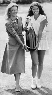 Mother Prints: Annabel Croft and her mother Susan carrying a Salmanazar of champagne (same as 12 bottles