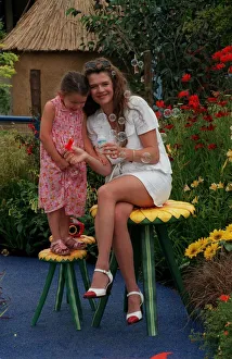 00145 Prints: Annabel Croft TV Presenter July 1998 With her daughter Amber at the Hampton court