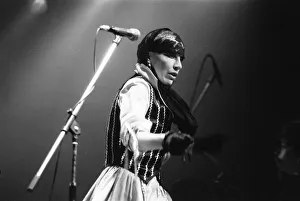 Head Scarf Prints: Annie Lennox, lead singer with the Tourist seen here performing on stage on the opening