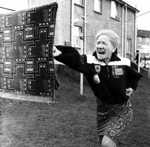 Weird Prints: Annie Sweeney (a grand mother) is using a piece of carpet as she practices Karate for her