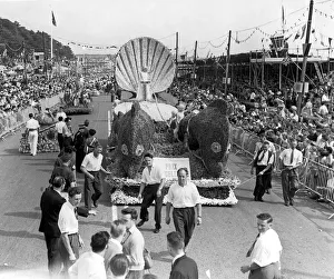 The annual Battle of Flowers carnival taking place on the island of Jersey in the Channel