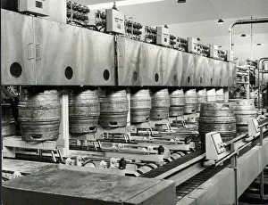 Brewing Prints: Ansells Brewery. Beer kegs being filled, and full ones discharged