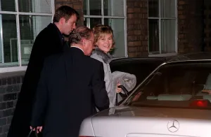 00145 Prints: Anthea Turner TV Presenter January 1999 Getting into the back of a silver mercedes