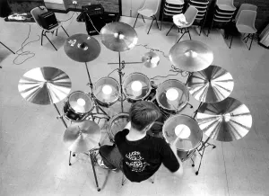 00116 Prints: Anthony Devlin is shown some of the tricks of the trade at a rock schol in August 1988
