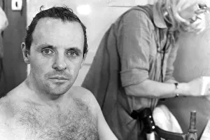 Dressing Room Prints: Anthony Hopkins sitting in dressing room being made up for filming - November 1978