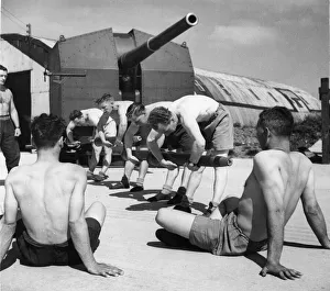 01444 Prints: Anti-aircraft gunners of Anti-aircraft Command are undergoing a new series of physical