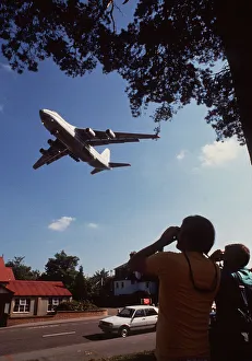 Antonov 124 Cargo aircraft comes in to land at Farnborough Aug 90 past two aircraft