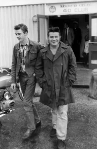 Antony Doab and his son Paul, 16, leave the Moss Side Inquiry today, 18th August 1981