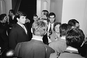 Antony Perkins (31) pictured with photographers & journalists outside hotel room / closed
