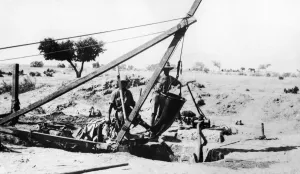 00407 Prints: ANZAC Engineers using special leather bucket for raising water from deep wells