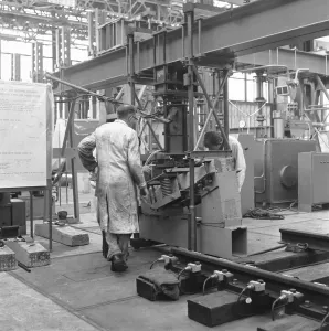 Derbyshire Prints: Apprentice at the British Rail Research Laboratories electrically testing a rail