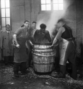 Barrels Prints: An apprentice cooper finishes his training seen her undergoing the Custom of finishing