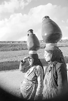 Core80 Prints: Two Arab women carrying water jars on their head on the Jerusalem road in Palestine