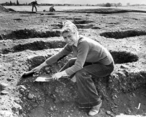 Archaeology Prints: Archaeology student Rosie Barnes at work on the Bronze Age site near Milfield