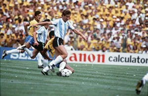 Argentina v Brazil 1982 World Cup match Calderon tackled by Luisinho