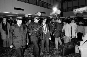01228 Prints: Armed Police at Heathrow Airport - January 1986 Television Film Crew Filming