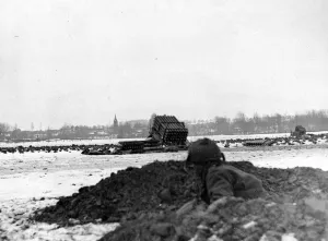 01443 Prints: The Armys new rocket weapon. A rocket projector Canadian unit lays down a barrage