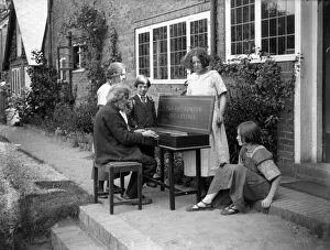 Arnold Dolmetsch, a French-born musician and instrument maker