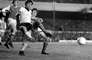 Arsenal (1) v. Ipswich (1). John Wark clears from Frank Stapleton