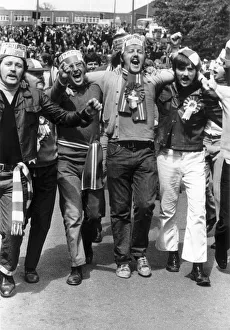 Arsenal football fans celebrate after their teams cup final win against Liverpool