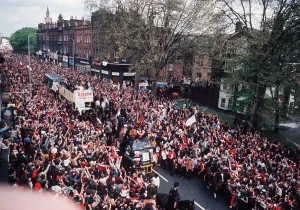 F A Cup Prints: Arsenal football team bus returns to Highbury with League Championship Cup