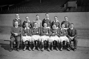 Arsenal football team pose for a group photograph along with manager Herbert Chapman