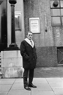 Unhappy Prints: Arsenal inside forward George Eastham stands outside his club
