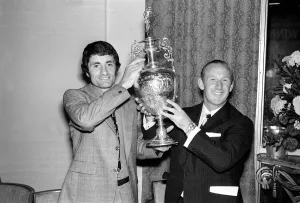00006 Prints: Arsenals Frank McLintock & Bertee Mee at party 1971 celebrating winning