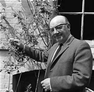 Arthur Lowe actor in his garden June 1965