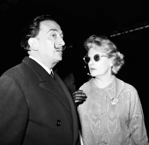 Artist Salvador Dali arrives in the UK, on the continental boat train to promote his