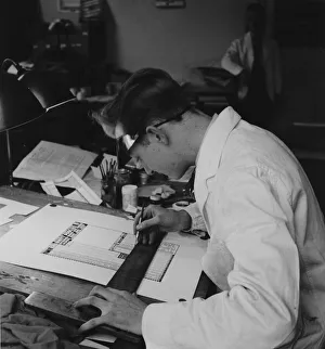 00369 Prints: An artists preparing pools coupons for the following week at the Unity Pools headquarters
