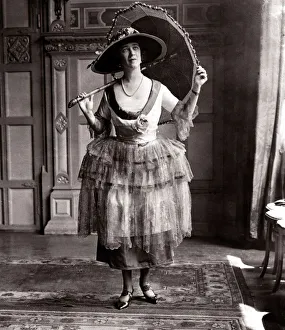 00181 Prints: Ascot frock - June 1921 woman in dress holding a umbrella