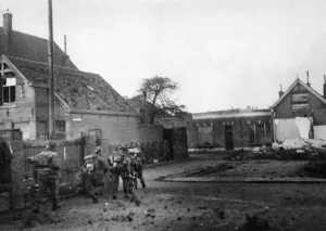 Holland Prints: Assault troops advancing through the streets of Flushing (Vlissingen). November 1944