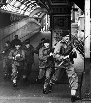 Exercise Prints: Assault troops of the Cheshire Regiment dash on to the Liverpool Landing Stage to take