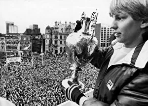 00441 Collection: Aston Villa footballer Gary Shaw shows of the the league Championship trophy to