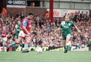 Aston Villa footballer Paul McGrath in action during the Premier league match against