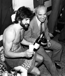 Former Prints: Aston Villa Manager Ron Saunders and Captain Denis Mortimer celebrating with champagne