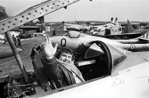 00921 Prints: Astrologer Russell Grant poses in the cockpit of a Lockheed Shooting Star during his