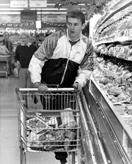 Supermarket Prints: Athlete Steve Cram Steve Cram pushing the shopping trolley around Presto