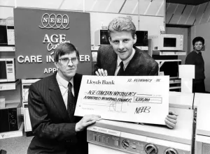 00399 Prints: Athlete Steve Cram Steve Cram receives a cheque from Alan Groves of NEEB